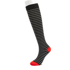 Red and black bottom horizontal bars on the soles of the feet