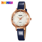 Rose gold shell blue strap