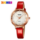 Rose gold shell red strap